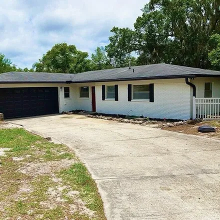Buy this 3 bed house on 18707 Yocam Ave in Lutz, Florida