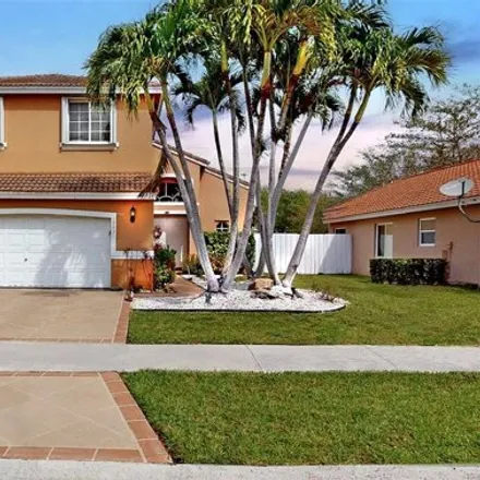 Rent this 4 bed house on 19475 Southwest 2nd Street in Pembroke Pines, FL 33029
