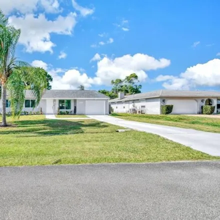Rent this 3 bed house on 1633 Southeast Minorca Avenue in Port Saint Lucie, FL 34952