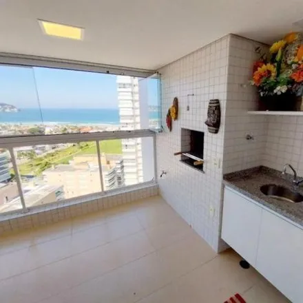 Rent this 3 bed apartment on Avenida Puglisi in Pitangueiras, Guarujá - SP