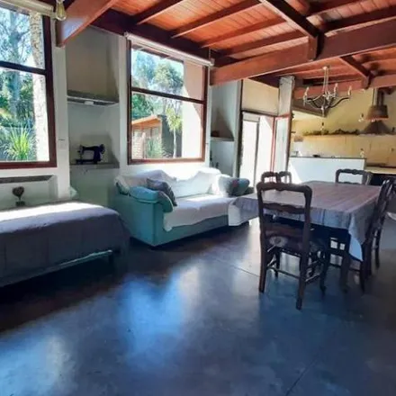 Buy this 3 bed house on Los Huarpes in Bosque de Peralta Ramos, B7603 DRT Mar del Plata