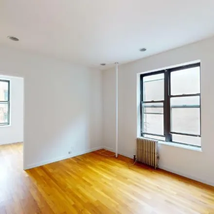 Rent this 2 bed apartment on Kumo Sushi in East 13th Street, New York