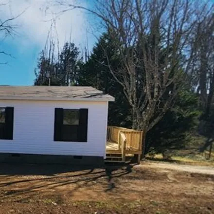 Buy this studio apartment on 160 Sawmill Circle in De Lap, Campbell County
