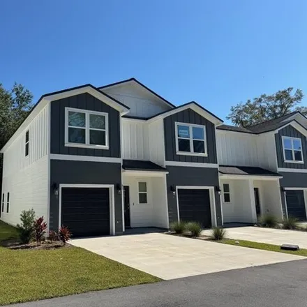 Rent this 3 bed townhouse on 272 Prado St Unit B1 in Apalachicola, Florida