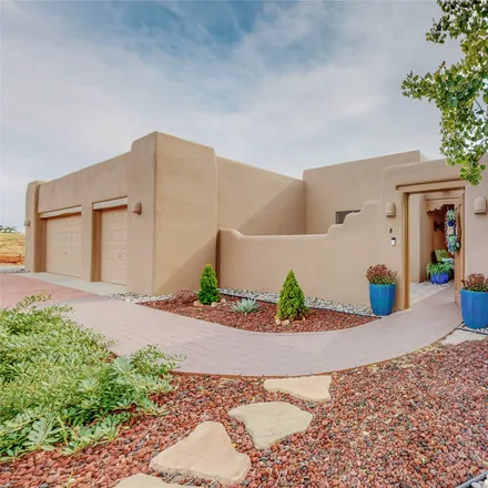 Buy this 3 bed house on 8 Moya Loop in Eldorado at Santa Fe, NM 87508