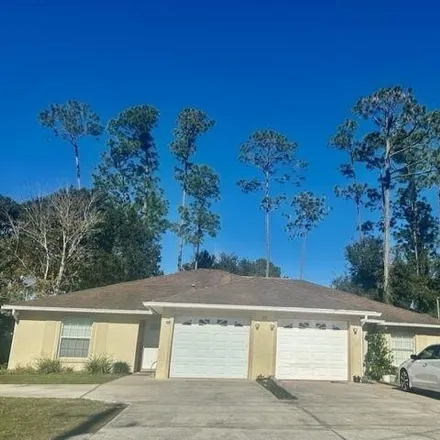 Buy this 5 bed house on 31 Wellwater Drive in Palm Coast, FL 32164