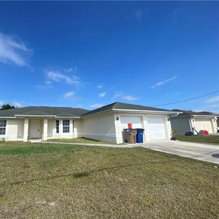 Rent this 3 bed house on 4304 12th Street West in Lehigh Acres, FL 33971