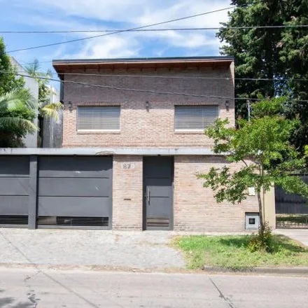 Buy this 4 bed house on 489 y Camino Centenario in Calle 489, Partido de La Plata