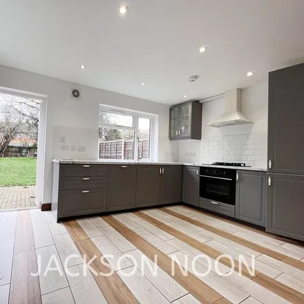 Rent this 4 bed duplex on Ronelean Road in London, KT6 7LL