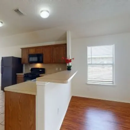 Rent this 4 bed apartment on 7226 Durango Creek Lane