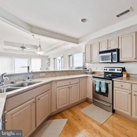 Image 2 - Captains' Galley, 1021 Dock Street, Jersey, Crisfield, MD 21817, USA - Condo for sale