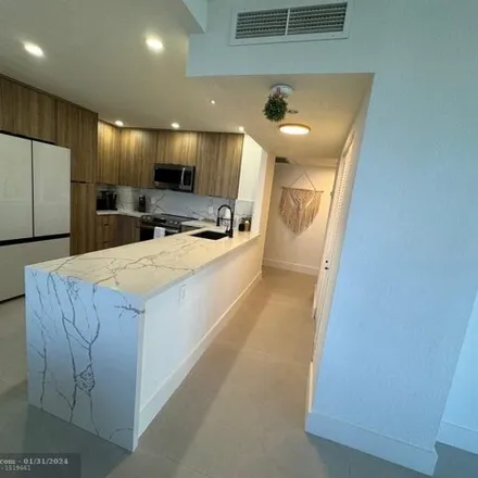 Rent this 2 bed condo on Juniper On The Water in Hemispheres, Hallandale Beach