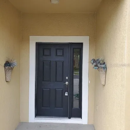 Rent this 3 bed townhouse on 2979 Ashland Lane South in Kissimmee, FL 34741