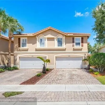 Rent this 3 bed house on 4240 Cohune Palm Court in Greenacres, FL 33463