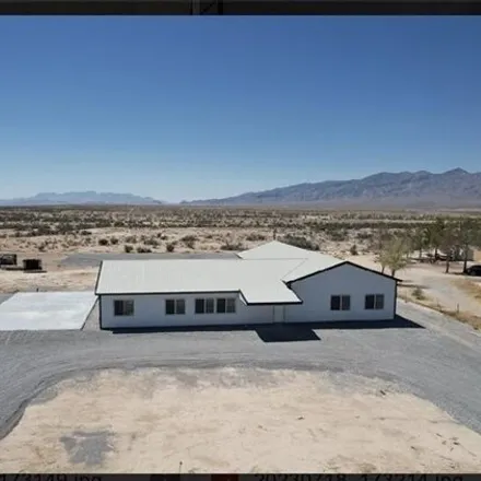 Buy this 6 bed house on 1323 East Bowler Drive in Pahrump, NV 89048