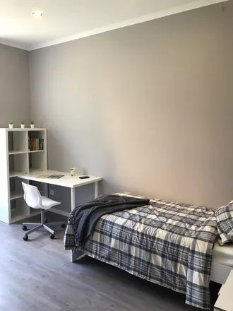 Rent this 8 bed room on Avenida Luís Bívar 7 in 1050-228 Lisbon, Portugal