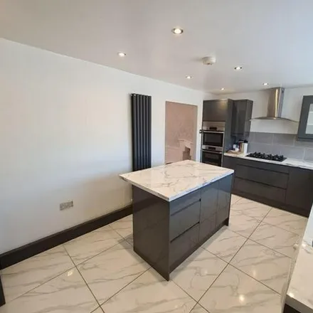 Rent this 3 bed townhouse on Cranford Drive in London, UB3 4LN