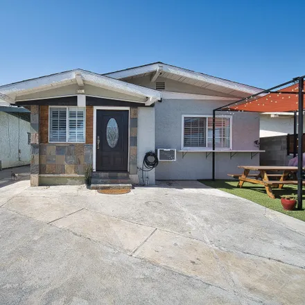 Buy this 4 bed house on 1513 West 55th Street in Los Angeles, CA 90062