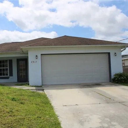 Rent this 3 bed house on 2987 44th Street West in Lehigh Acres, FL 33971