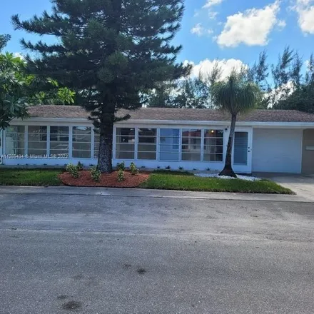 Rent this 4 bed house on 1340 Flamingo Drive in Lantana, FL 33462