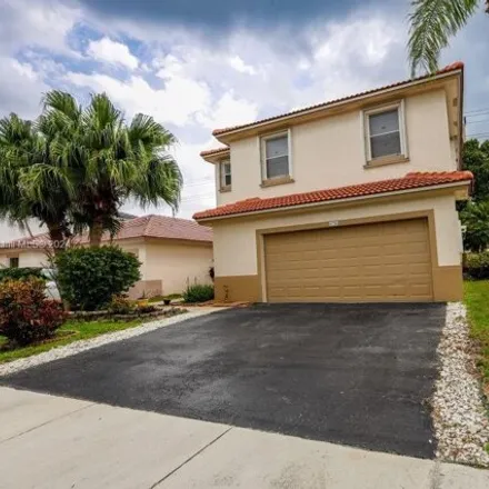 Rent this 4 bed house on 6756 Northwest 69th Court in Tamarac, FL 33321