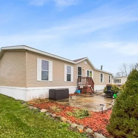 Buy this studio apartment on 355 North Chevalier Drive in Howell, MI 48843