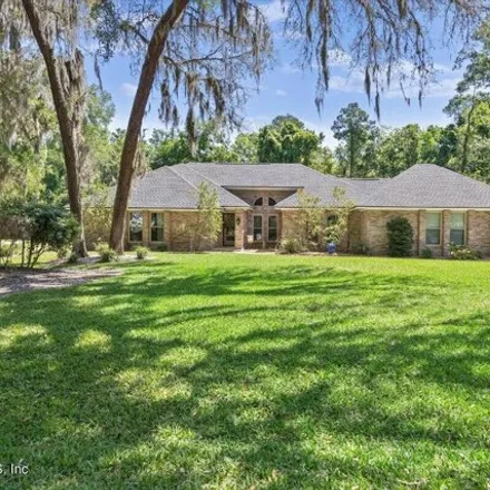 Buy this 4 bed house on 489 Cheryl Court in Fruit Cove, FL 32259