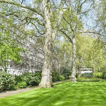 Rent this 3 bed apartment on Lownes Square Gardens in Lowndes Square, London