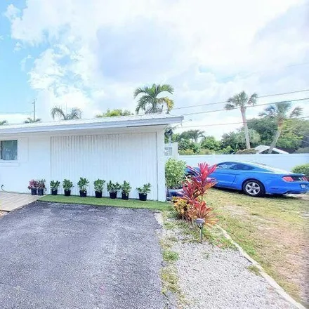 Buy this 3 bed house on 5684 Silvian Road in Palm Beach County, FL 33415