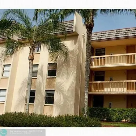 Rent this 2 bed condo on Forest Hills Drive in Coral Springs, FL 33065