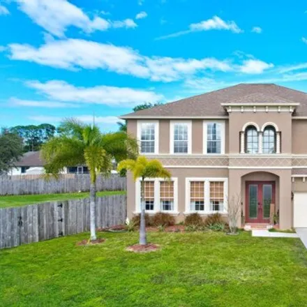 Buy this 5 bed house on 5298 Meg Court in Port Saint Lucie, FL 34986