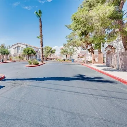 Rent this 3 bed townhouse on 4019 Castle Cove Drive in Las Vegas, NV 89108