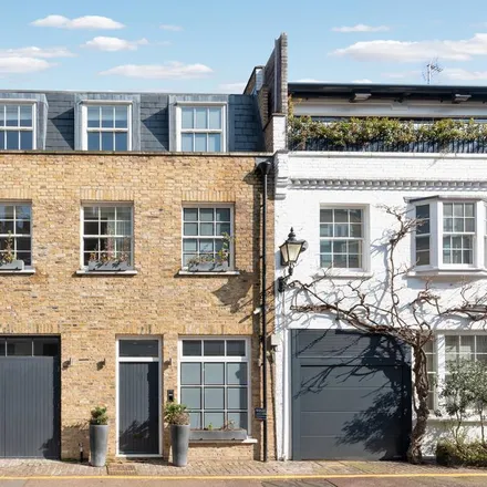 Rent this 3 bed townhouse on 52 Clabon Mews in London, SW1X 0EE
