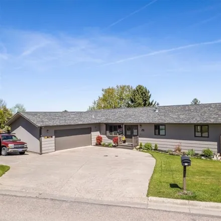 Buy this 4 bed house on 548 Ben Hogan Drive in Missoula, MT 59803