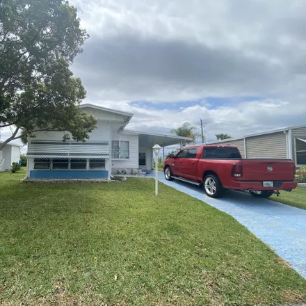 Buy this 2 bed house on 1011 Barefoot Circle in Brevard County, FL 32976