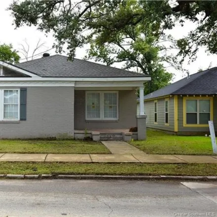 Buy this 4 bed house on Sacred Heart of Jesus Catholic Church in 1102 Mill Street, Lake Charles