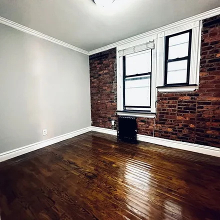 Rent this 2 bed apartment on Cibao Restaurant in 72 Clinton Street, New York