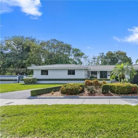Buy this 4 bed house on 7400 Sabal Drive in Miami Lakes, FL 33014