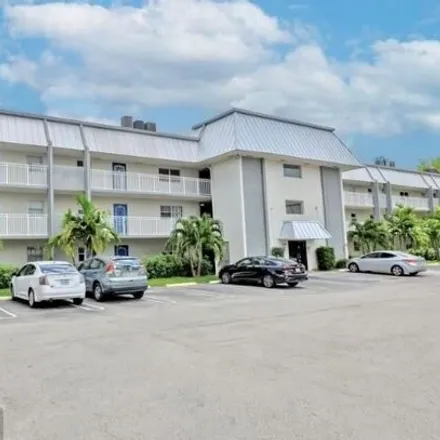 Buy this 2 bed condo on Riverside Drive in Coral Springs, FL 33065