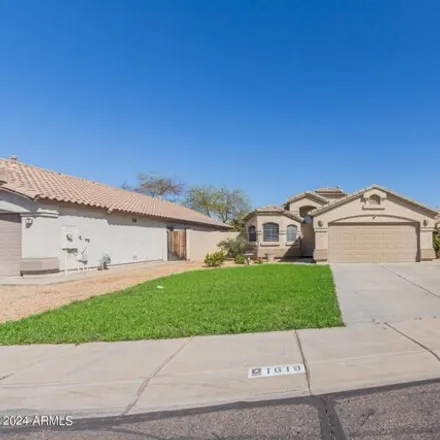 Rent this 3 bed house on 1619 North 125th Lane in Avondale, AZ 85392