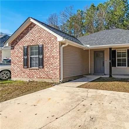 Buy this 4 bed house on 3821 City Drive in Windsor Place, Slidell