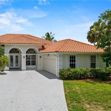 Rent this 4 bed house on Mahogany Isle Lane in Gateway, FL