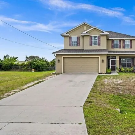 Buy this 5 bed house on 1814 Southwest 27th Terrace in Cape Coral, FL 33914