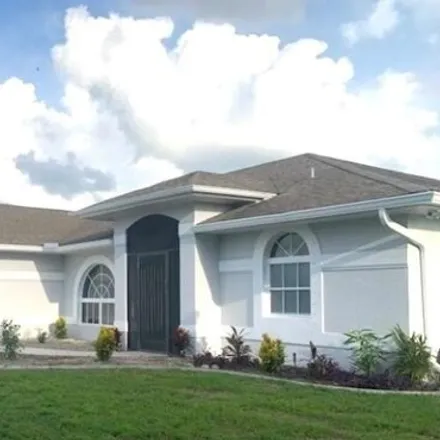 Buy this 3 bed house on 3033 Diplomat Parkway West in Cape Coral, FL 33993