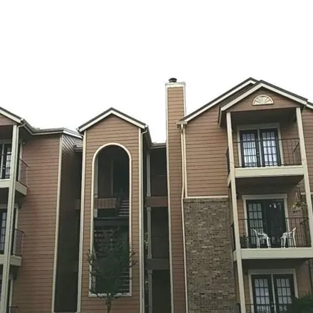 Rent this 2 bed condo on 11668 College Park Trail in University Park, Alafaya