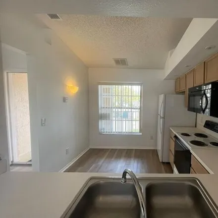 Image 4 - 13830 Timberland Drive, Meadow Woods, FL 32824, USA - Condo for rent