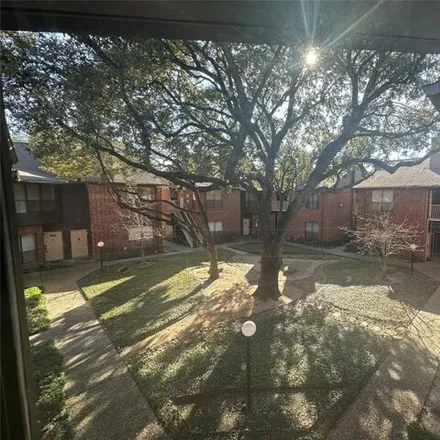 Rent this 2 bed condo on Library Loop Trail in Houston, TX 77042