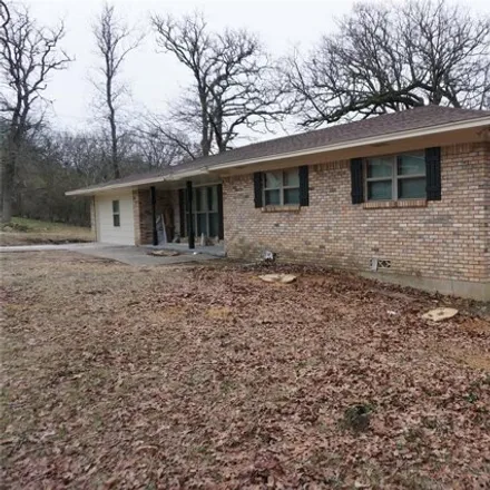 Rent this 3 bed house on 1498 Crestview Drive in Denison, TX 75020