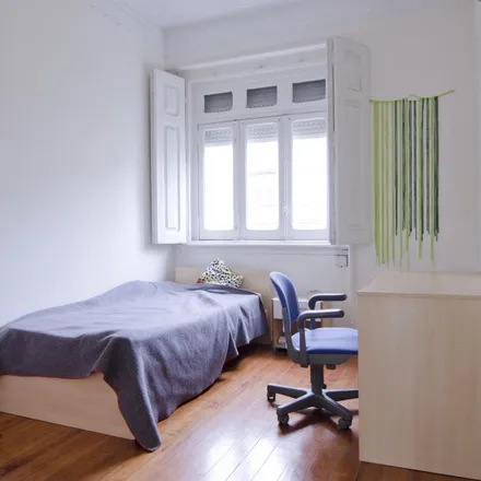 Rent this 3 bed room on Rua Alexandre Braga 5 in 1150-002 Lisbon, Portugal