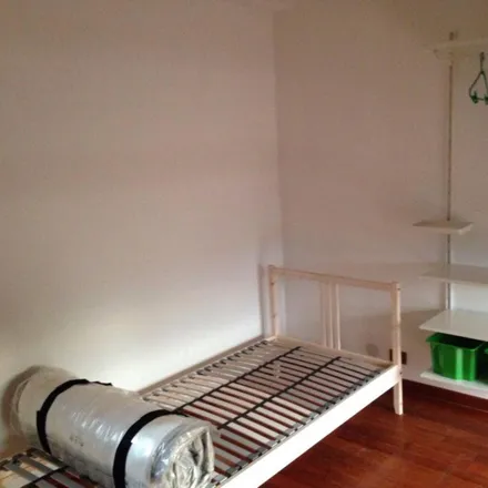 Rent this 4 bed room on Via Luigi Ploner in Rome RM, Italy